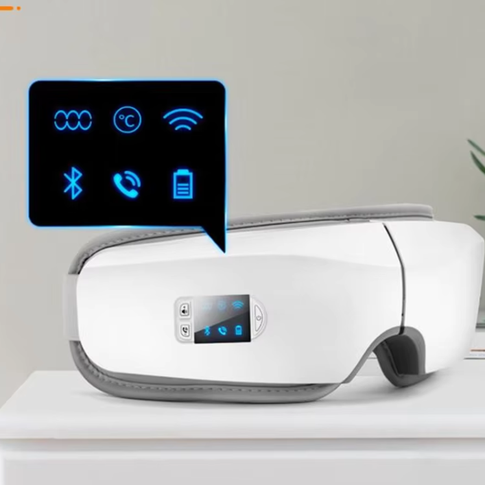 White bluetooth eye massager with digital display on a light gray background